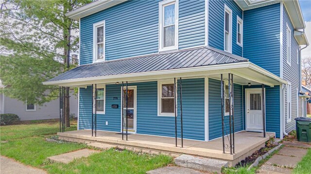 216 S Short St, Troy, OH 45373 - view of front of home featuring covered porch and metal roof