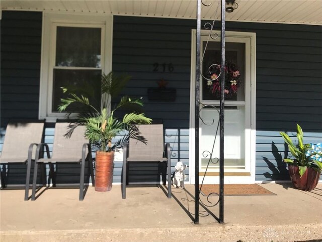 216 S Short St, Troy, OH 45373 - doorway to property featuring a porch