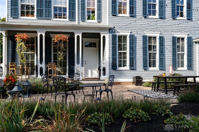 property entrance with a patio area