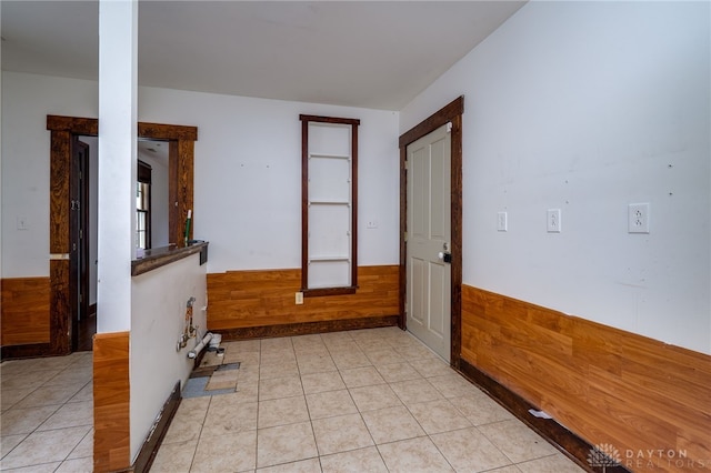 empty room with light tile patterned floors