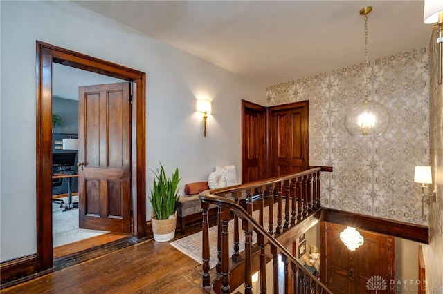 corridor featuring dark wood-type flooring