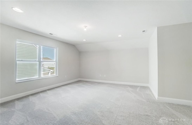 536 Hines Cir, Washington Twp, OH 45458 - additional living space with carpet floors, baseboards, lofted ceiling, and recessed lighting