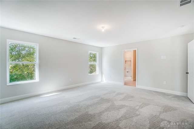 view of carpeted spare room