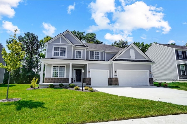 craftsman-style home featuring a porch and a front yard