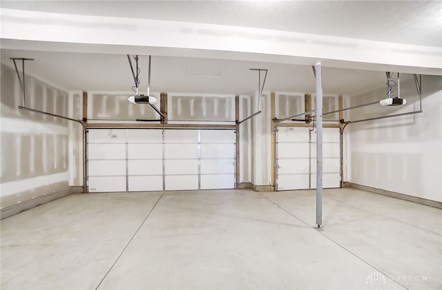 garage featuring a garage door opener