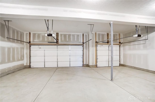 536 Hines Cir, Washington Twp, OH 45458 - garage featuring a garage door opener