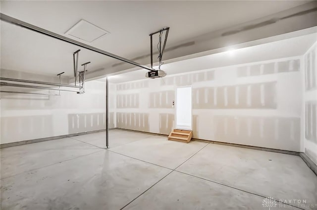 536 Hines Cir, Washington Twp, OH 45458 - garage featuring a garage door opener