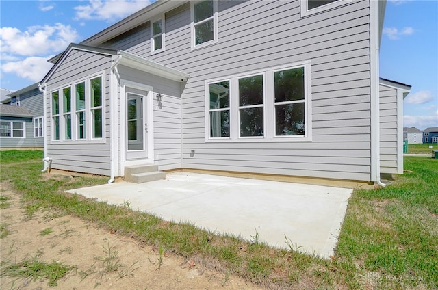 rear view of property with a patio area