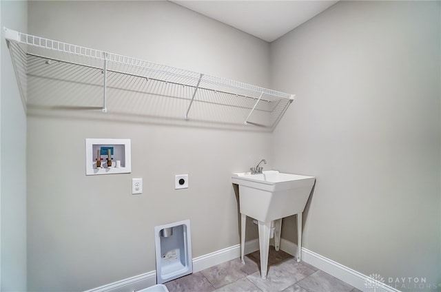 laundry area with light tile patterned flooring, electric dryer hookup, and washer hookup