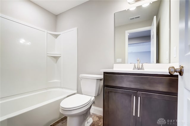 full bathroom featuring tile patterned floors, washtub / shower combination, vanity, and toilet