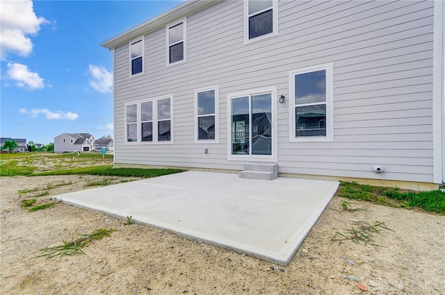 rear view of house with a patio