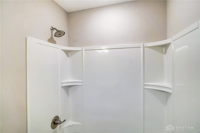 bathroom featuring walk in shower