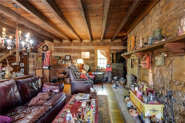 interior space with hardwood / wood-style floors, wooden ceiling, and beam ceiling