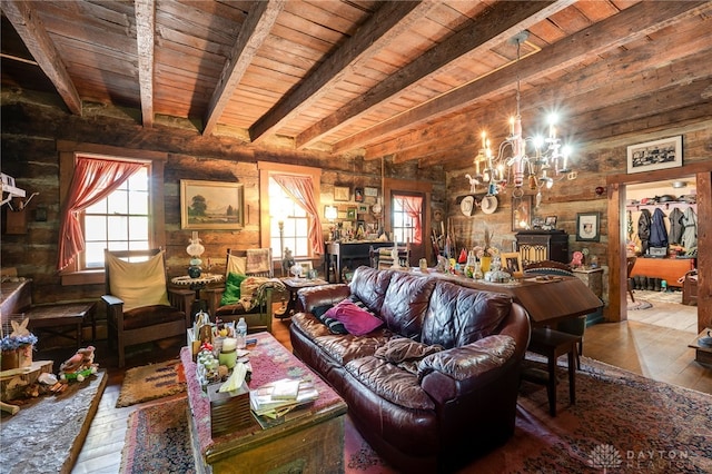 living room with an inviting chandelier, wood ceiling, wood-type flooring, and beamed ceiling