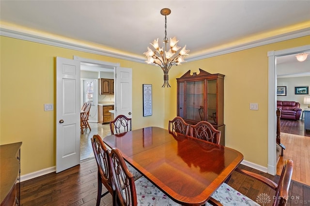 dining space with an inviting chandelier and wood-type flooring