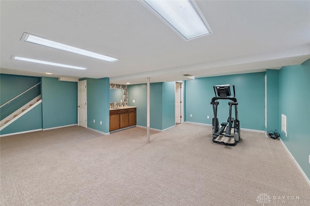 exercise room featuring carpet flooring