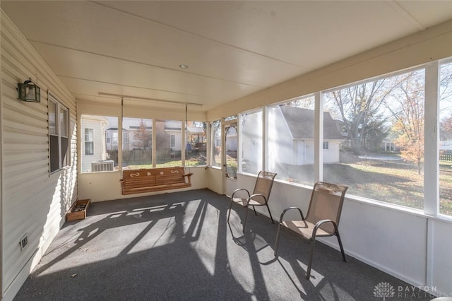 sunroom / solarium featuring a healthy amount of sunlight