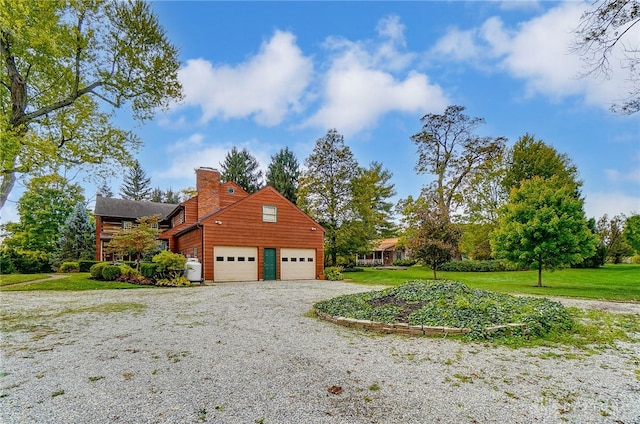 view of home's exterior with a yard