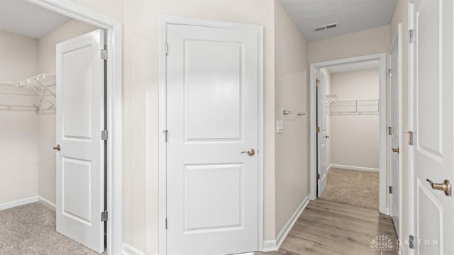 hall featuring light hardwood / wood-style floors