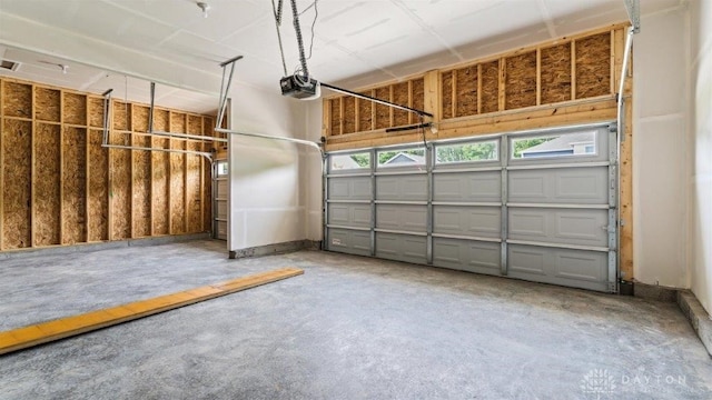 garage featuring a garage door opener