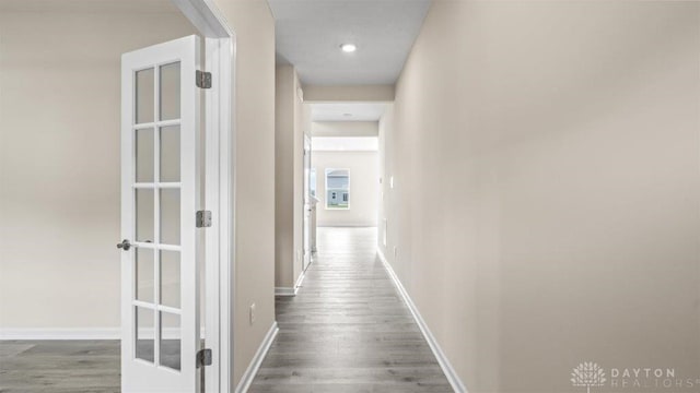 hallway featuring hardwood / wood-style floors