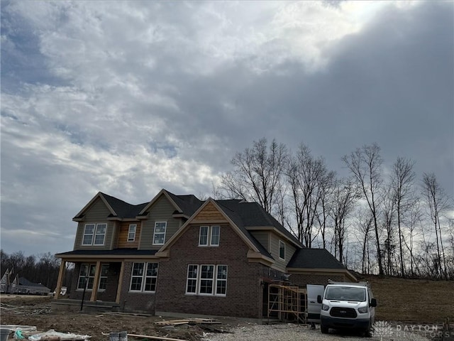 view of front of property featuring brick siding