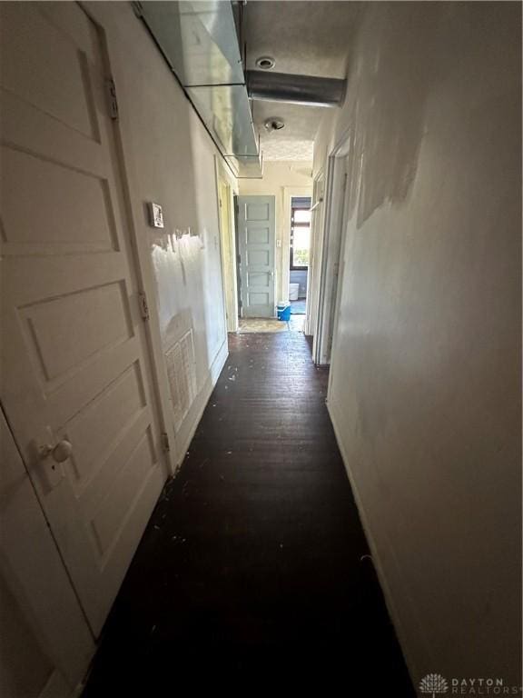 hall featuring dark hardwood / wood-style floors