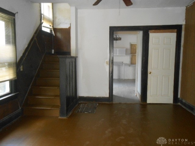 interior space featuring ceiling fan