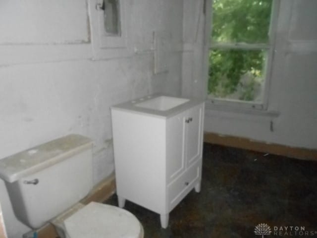 bathroom with toilet and sink