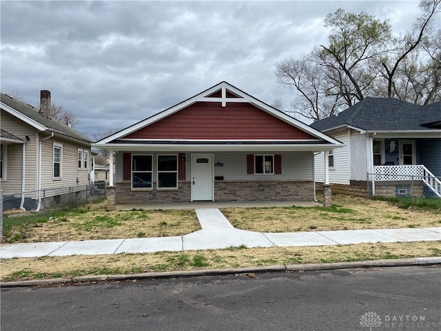 bungalow-style home with covered porch