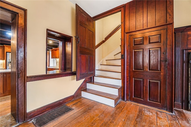 foyer featuring hardwood / wood-style floors