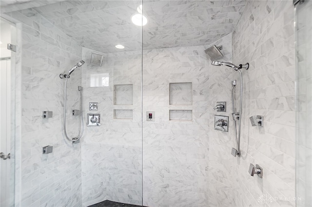 bathroom featuring tiled shower