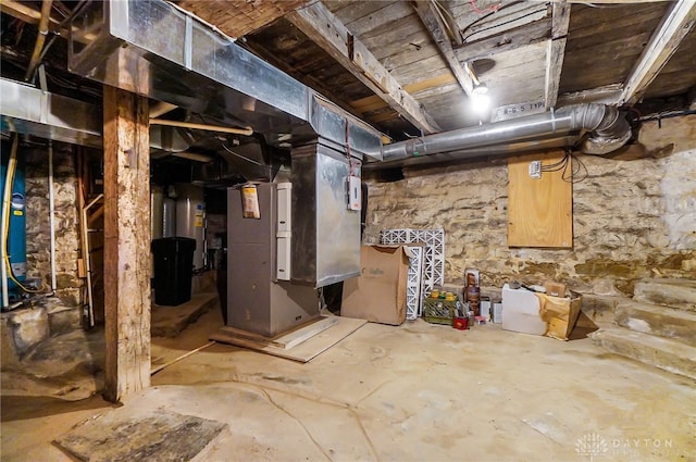 basement featuring electric water heater