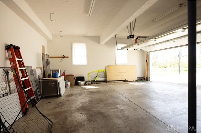 garage featuring a garage door opener