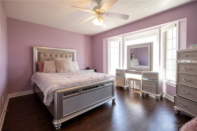 bedroom featuring ceiling fan and dark wood-type flooring