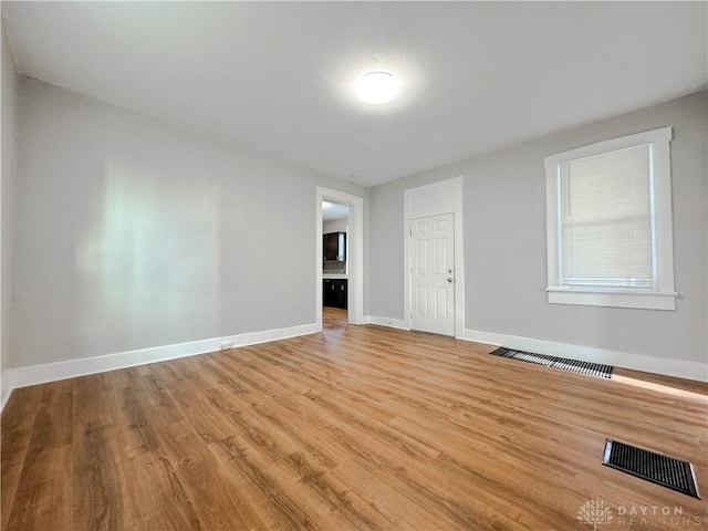 empty room featuring light wood-type flooring