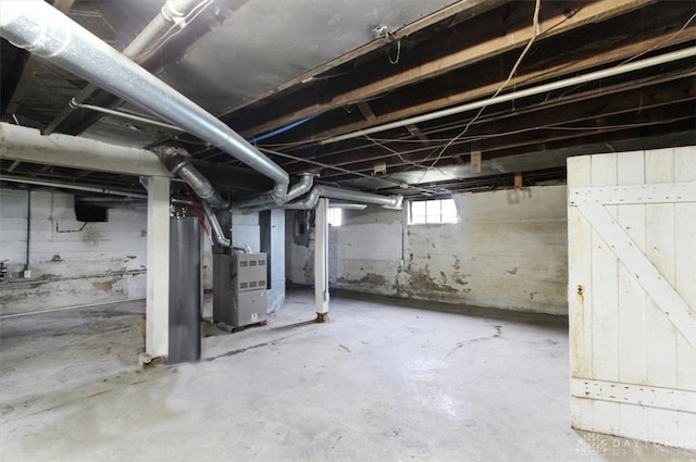 basement featuring heating unit