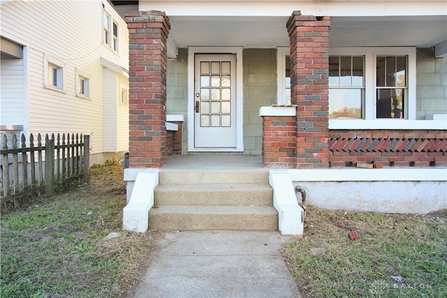 entrance to property with covered porch