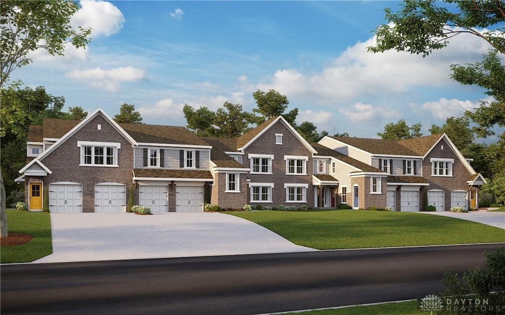 view of front facade featuring a front lawn and a garage