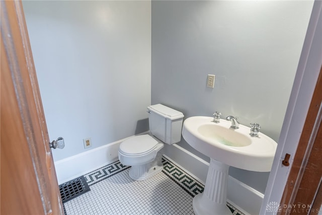 2696 Wilmington Rd, Lebanon, OH 45036 - half bath with toilet, baseboards, and tile patterned floors