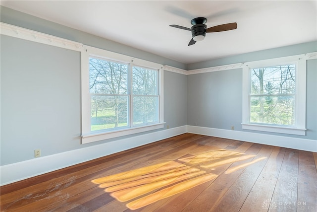 2696 Wilmington Rd, Lebanon, OH 45036 - unfurnished room with baseboards, a ceiling fan, and hardwood / wood-style floors
