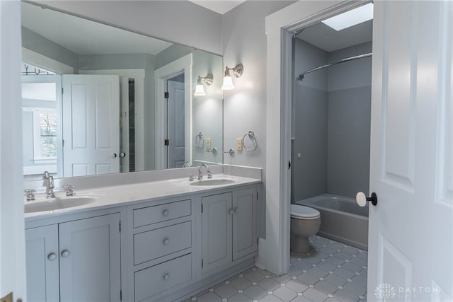 2696 Wilmington Rd, Lebanon, OH 45036 - full bathroom featuring double vanity, tile patterned floors, toilet, and a sink