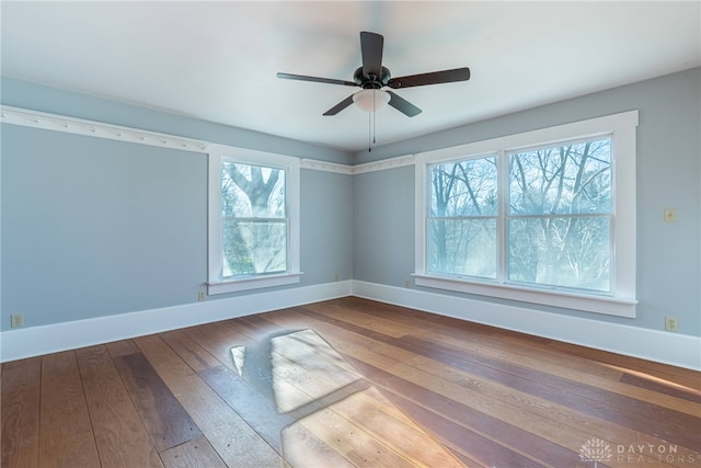 2696 Wilmington Rd, Lebanon, OH 45036 - unfurnished room featuring hardwood / wood-style flooring, baseboards, and a healthy amount of sunlight