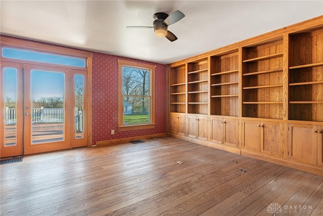 2696 Wilmington Rd, Lebanon, OH 45036 - empty room featuring wallpapered walls, hardwood / wood-style floors, and a ceiling fan