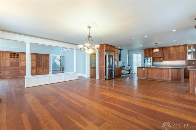 2696 Wilmington Rd, Lebanon, OH 45036 - unfurnished living room with dark wood finished floors, a notable chandelier, and recessed lighting