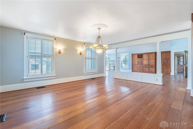 2696 Wilmington Rd, Lebanon, OH 45036 - interior space featuring hardwood / wood-style floors, baseboards, a chandelier, and a healthy amount of sunlight