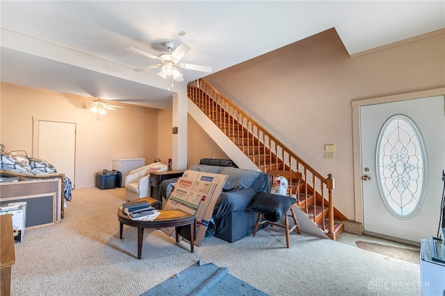 2696 Wilmington Rd, Lebanon, OH 45036 - carpeted living room featuring stairway and ceiling fan