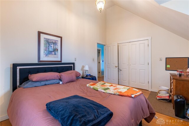 2696 Wilmington Rd, Lebanon, OH 45036 - bedroom featuring high vaulted ceiling, baseboards, and a closet