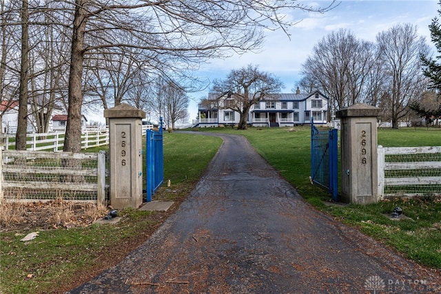2696 Wilmington Rd, Lebanon, OH 45036 - view of street with a gated entry, aphalt driveway, and a gate