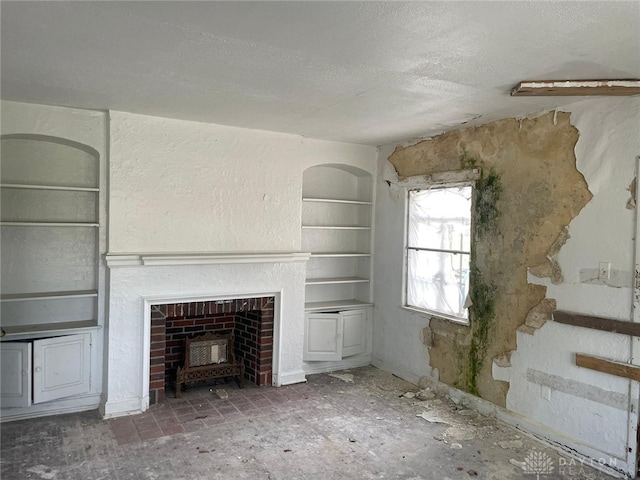 unfurnished living room with a fireplace